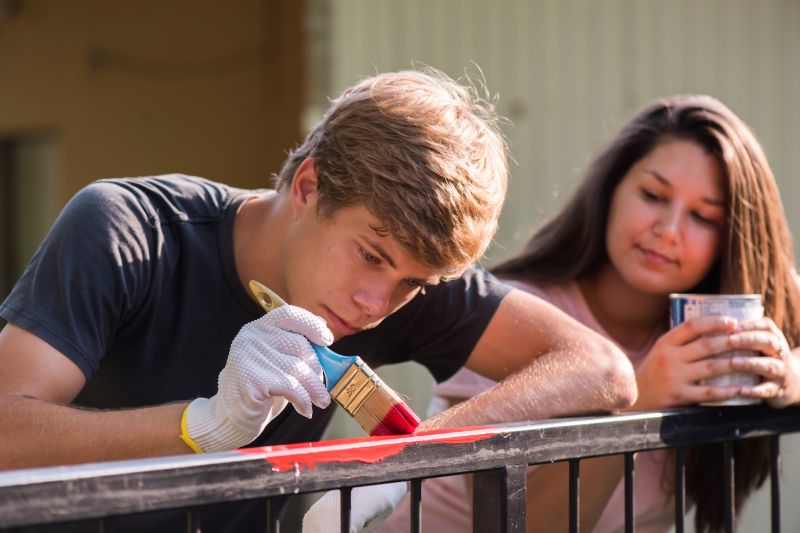 Fence Painting in Action